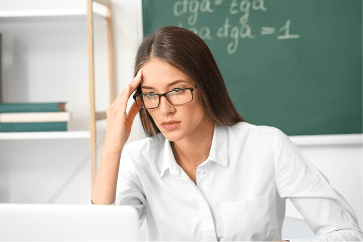 A worried teacher concerned about content security and revenue loss